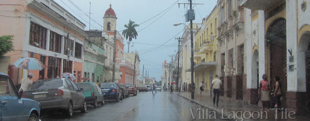 An afternoon shower in Cienfuegos, Cuba. We ducked into a toy shop, as did many others trying to avoid getting drenched.